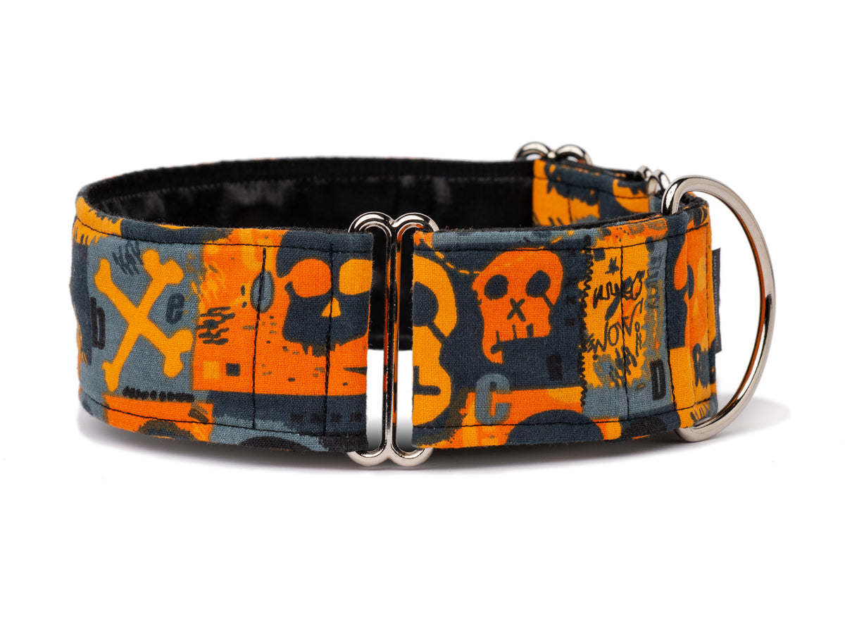 Edgy black and orange skulls and bones collar make the perfect fashion statement for that four-legged tuff guy or gal.