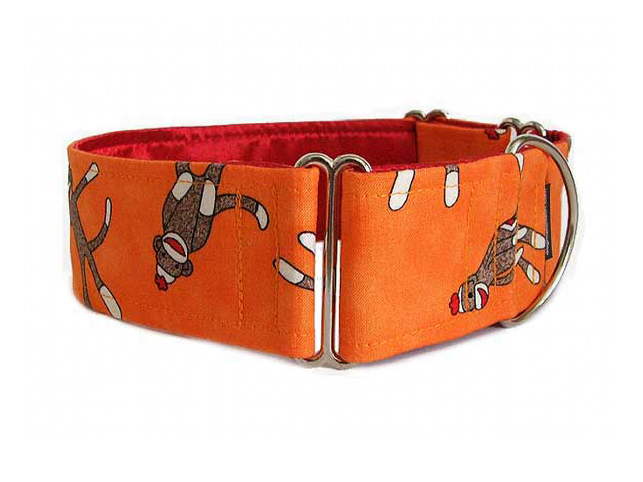 These cute sock monkeys on bright orange are sure to please any playful pooch! 