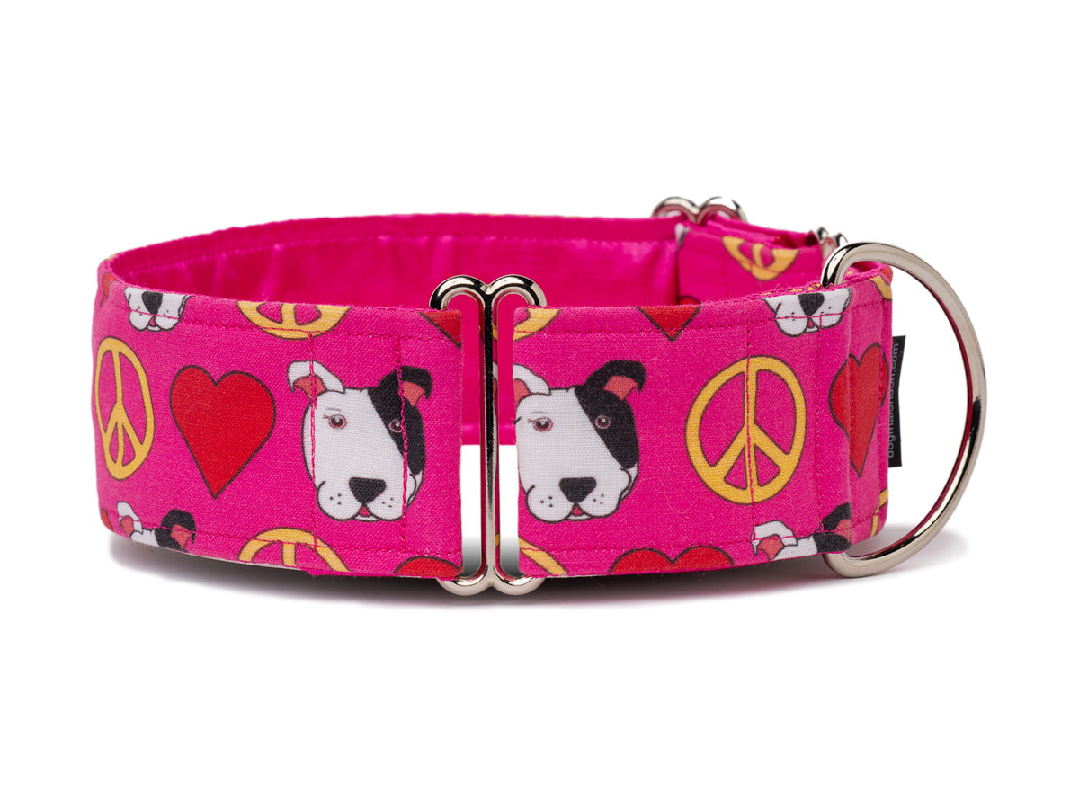 Your pooch can spread joy wherever he or she goes in this happy pink collar with peace symbols, hearts, and cute puppy faces!